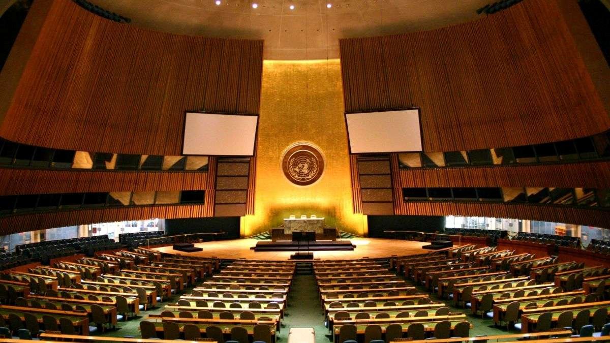 The United Nations General Assembly Hall represents international governance debates over lethal autonomous weapons systems and the LAWS treaty process