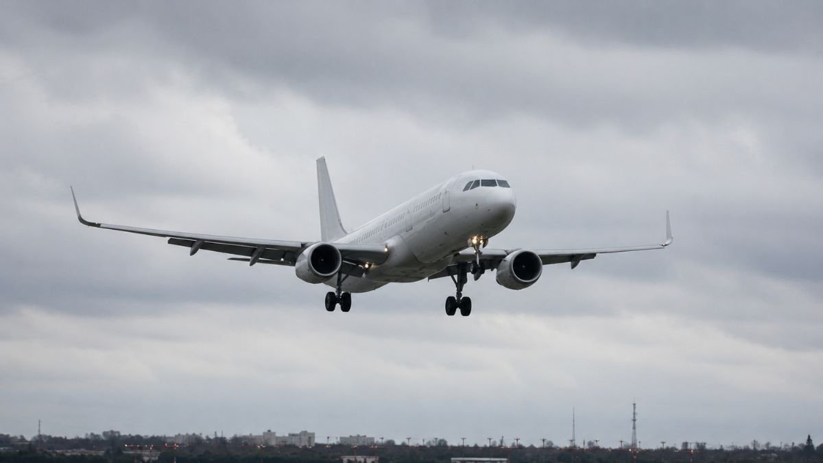 Commercial passenger aircraft on final approach representing civilian aviation disruption caused by GPS spoofing and jamming in contested airspace