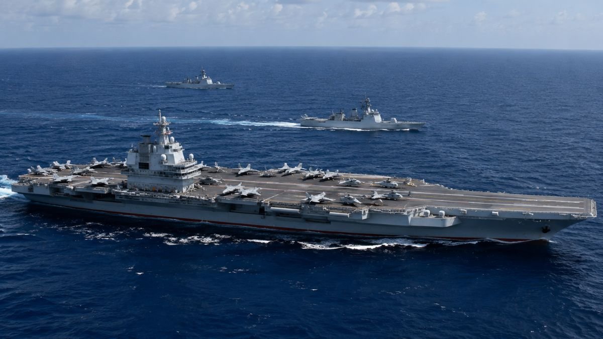 Aircraft carrier at sea representing China's PLAN carrier programme and advanced naval aviation modernization