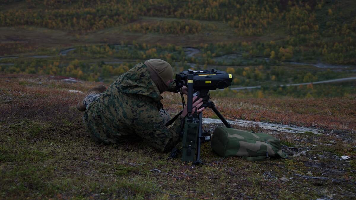 U.S. Marine operating a laser target designator during JTAC training in Norway