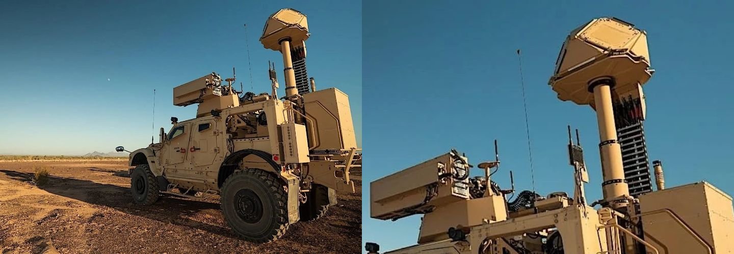 Counter-drone defense vehicle with elevated sensor equipment deployed in an open field
