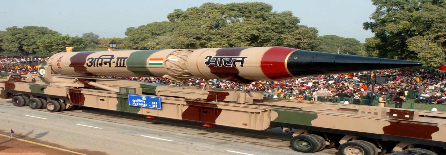 Indian Agni-III ballistic missile on a transporter representing India's missile force modernization
