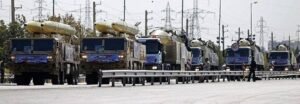 Iranian ballistic missile launchers on transport vehicles during a military display