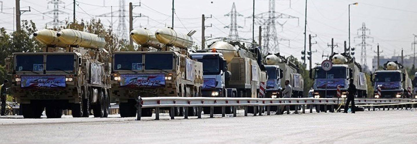 Iranian ballistic missile launchers on transport vehicles during a military display